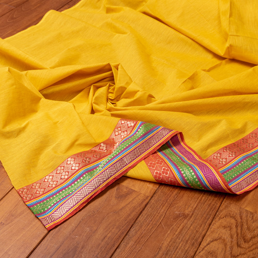 南インドのハーフボーダー・シンプル・コットン布〔幅約110cm〕 - オレンジ系1枚目の説明写真です