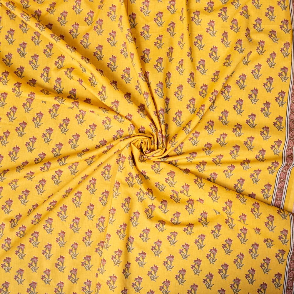 〔1m単位切り売り〕南インドの小花柄布〔約106cm〕 - イエロー1枚目の説明写真です