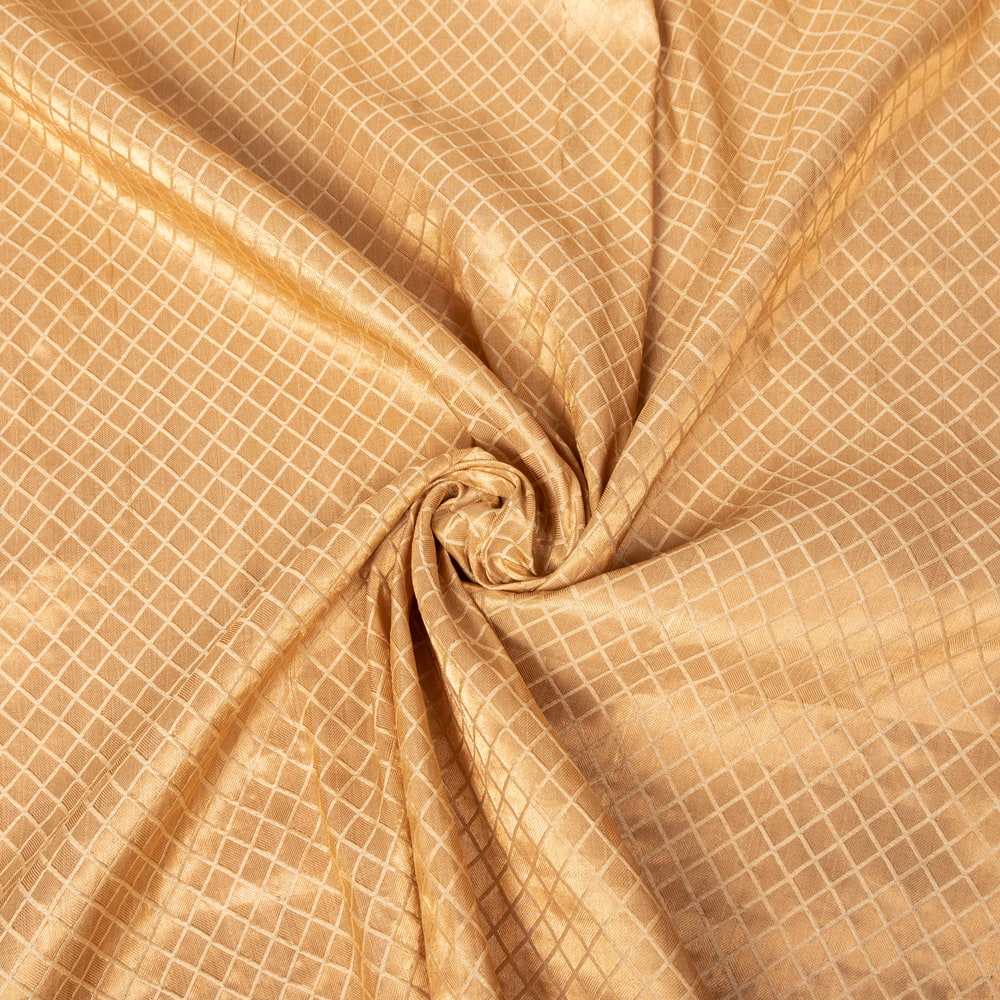 〔1m切り売り〕インドの伝統模様布　光沢感のあるゴールド系生地〔幅約106cm〕1枚目の説明写真です