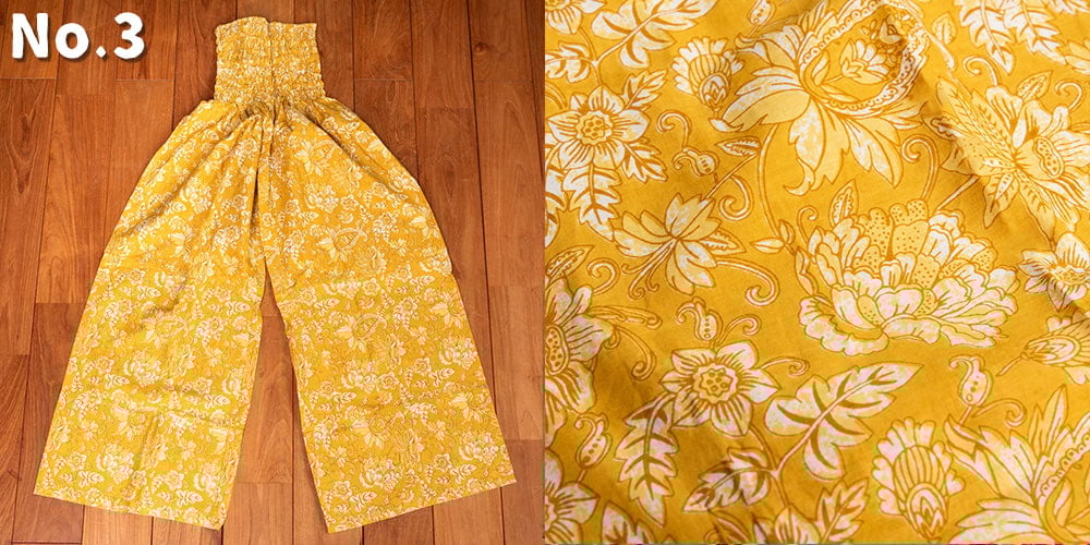 ローライズのカラフルプリントのワイドパンツ3枚目の下部説明写真です