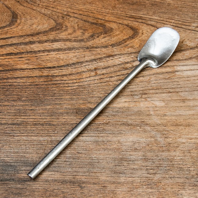 インドネシアのお菓子「アペム」をころがすヘラ オールステンレス 20ｃｍの写真アペム,インドネシア,バリ島,スパチュラ,フライ返し,木柄ヘラ,屋台キッチン,エスニック調理器具,南国の台所,伝統菓子道具