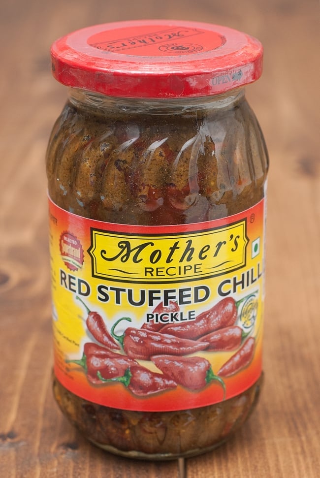 赤唐辛子ピクルス-Red Stuffed Pickle-【Mother】の写真1枚目です。大き目にカットした野菜を丁寧に漬けこみました。製造会社ごとに秘伝の味付けがあり味が違いますので、食べ比べてみてお好みの一品を探してみてはいかがでしょうか。Mother,インド料理,インド,アチャール,ピクルス,ミックス