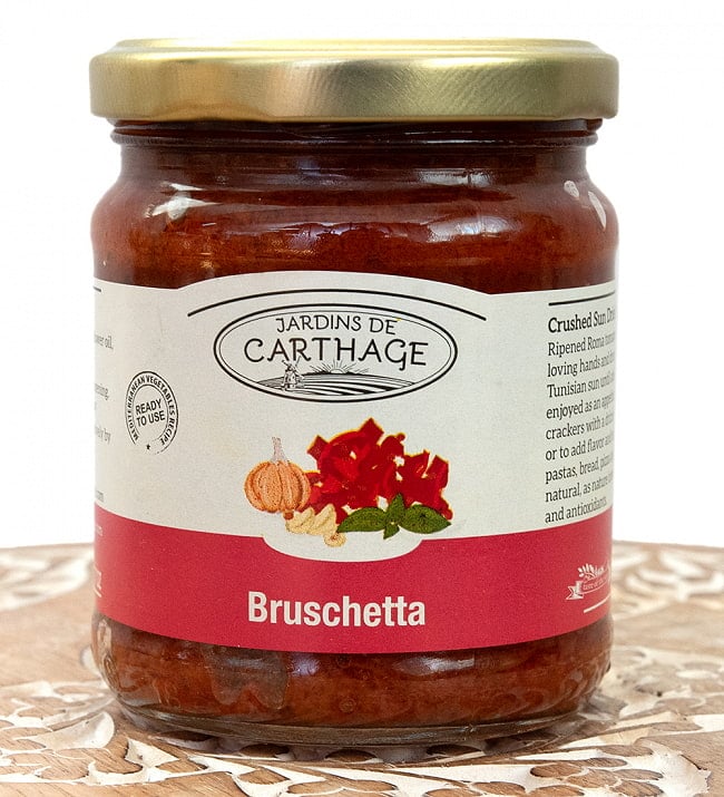 ブルスケッタ 天日干しトマトのみじん切り - Bruschetta【JARDINS DE CARTHAGE】の写真1枚目です。完熟トマトを油漬けにしました。濃厚なトマトの味を堪能できます。地中海料理,チュニジア,ドライトマト,トマトソース,ブルスケッタ