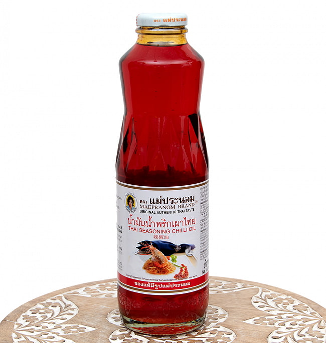シーズニングオイル 瓶 Lサイズ　タイのラー油 [750ml]【メープラノム】の写真1枚目です。全体写真ですタイ料理,タイ,ラー油、チリオイル、シーズニングオイル、メーパノム、メープラノム、MAEPRANOM