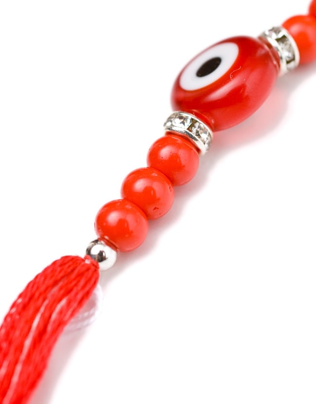 ナザール・ボンジュウのシンプル紐ブレス 3 - 装飾部分を違う角度からアップしてみました