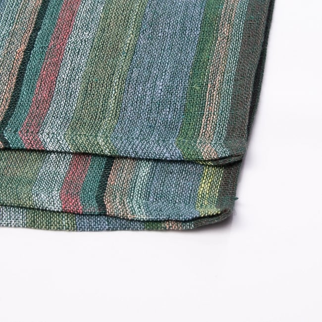 〔225cm×150cm〕柔らか手触りのイタワ織りマルチクロス - オリーブグリーン 2 - 縁の部分の拡大写真です。ほつれないように折り返し裁縫されています。