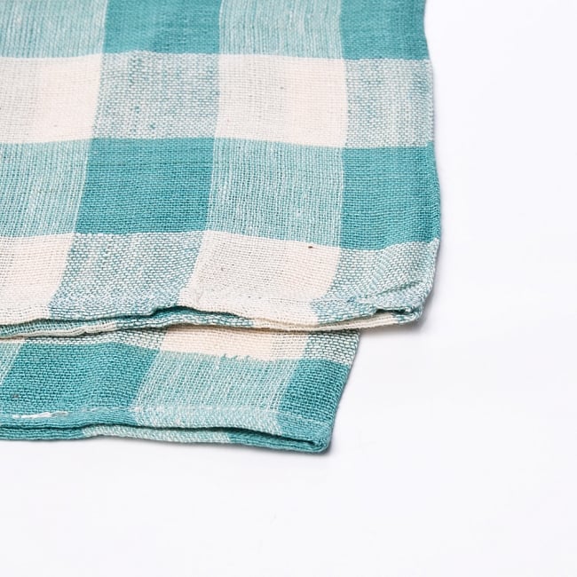 〔225cm×150cm〕柔らか手触りのイタワ織りマルチクロス - ターコイズグリーン 2 - 縁の部分の拡大写真です。ほつれないように折り返し裁縫されています。