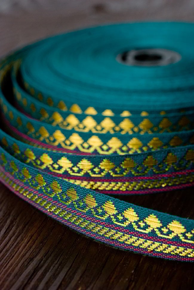 (幅:約1cm)細幅のチロリアンテープ(1m売り) - 青緑の写真