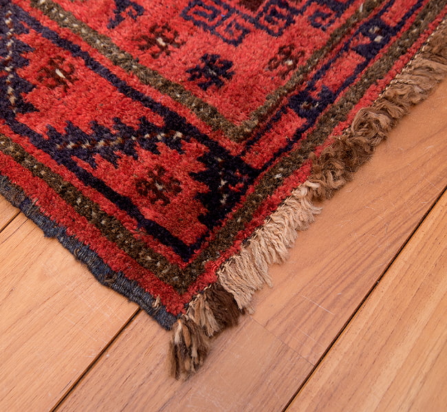 遊牧民バローチの手織り絨毯【約100cm x 60cm】 7 - フリンジの部分です