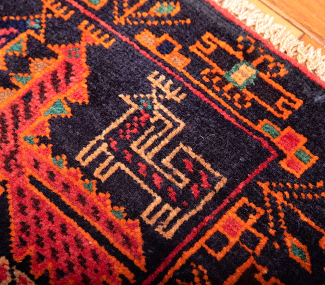 遊牧民バローチの手織り絨毯【約180cm x 116cm】 8 - フリンジの部分です