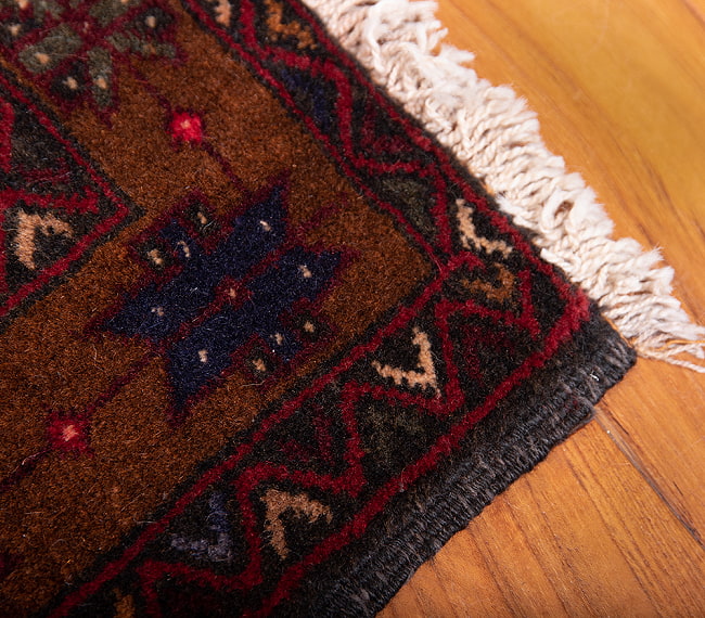 遊牧民バローチの手織り絨毯【約186cm x 100cm】 10 - フリンジの部分です