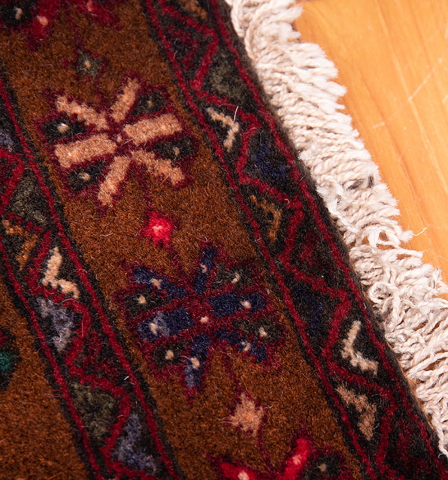 遊牧民バローチの手織り絨毯【約186cm x 100cm】 9 - フリンジの部分です