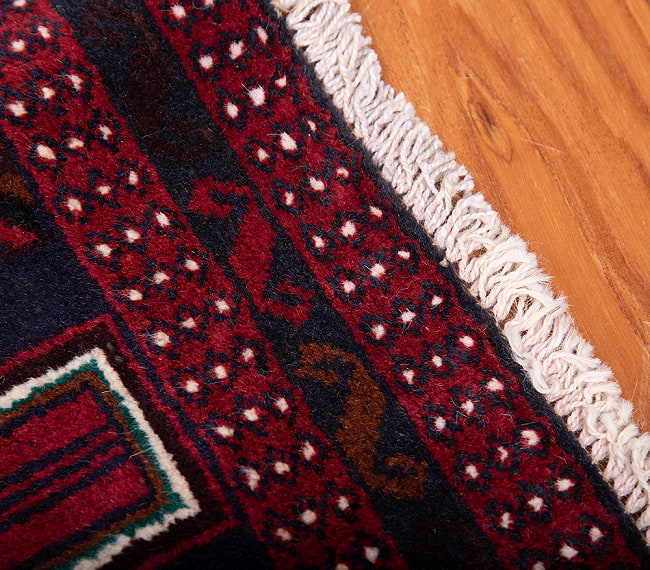 遊牧民バローチの手織り絨毯【約200cm x 115cm】 8 - フリンジの部分です
