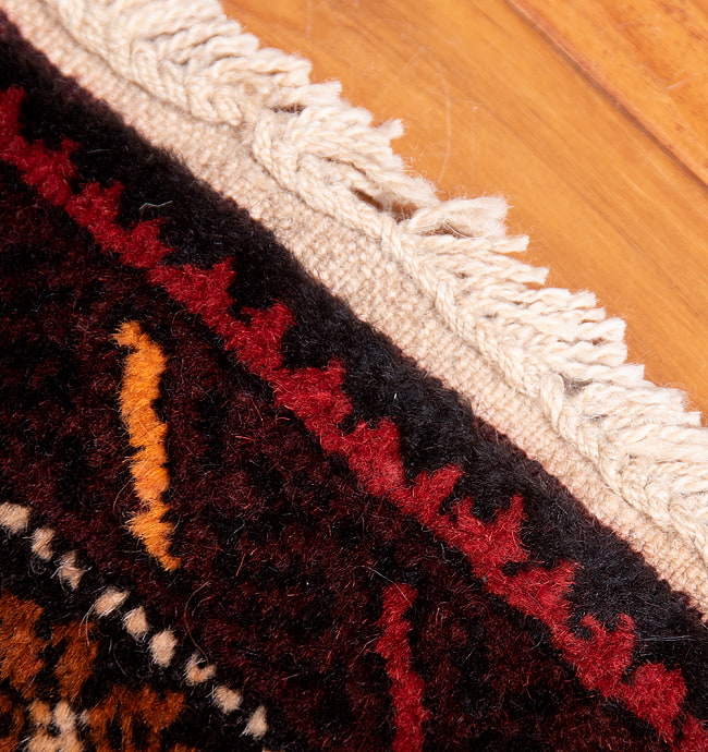 遊牧民バローチの手織り絨毯【約190cm x 101cm】 9 - フリンジの部分です