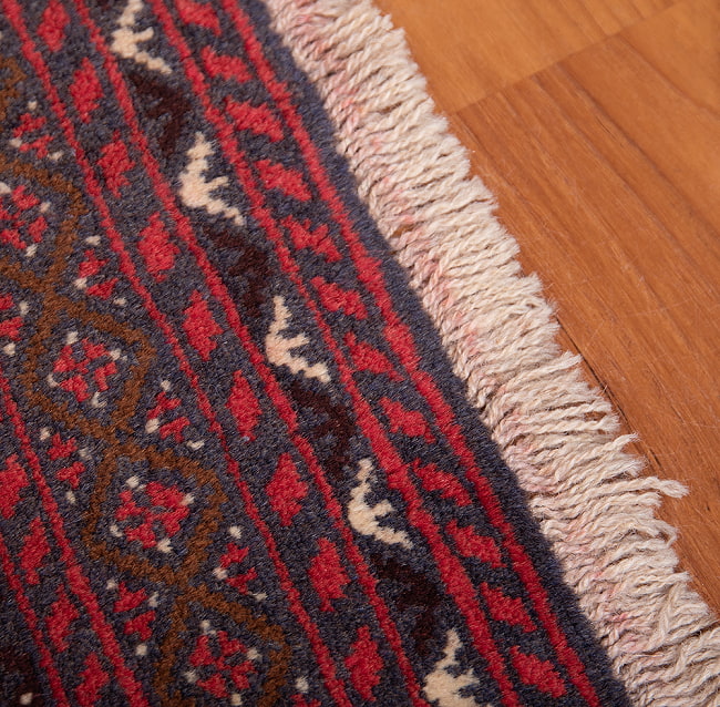 遊牧民バローチの手織り絨毯【約193cm x 107cm】 7 - フリンジの部分です