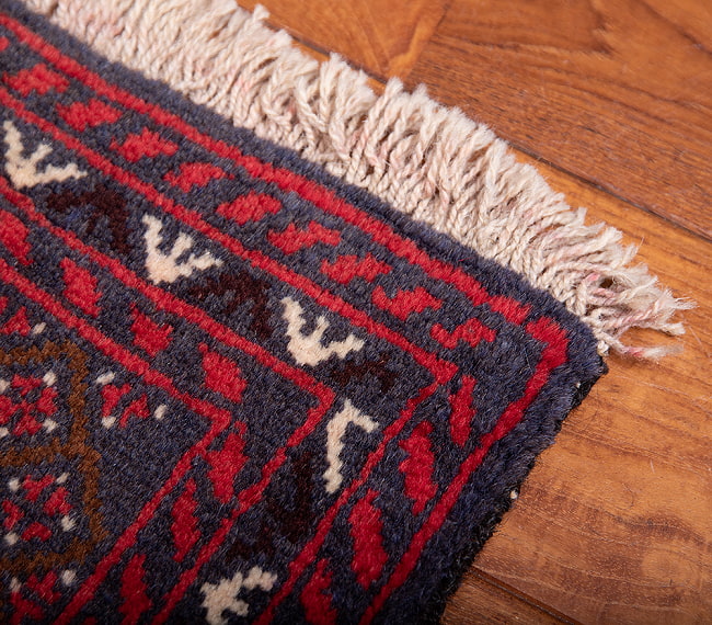 遊牧民バローチの手織り絨毯【約193cm x 107cm】 8 - フリンジの部分です