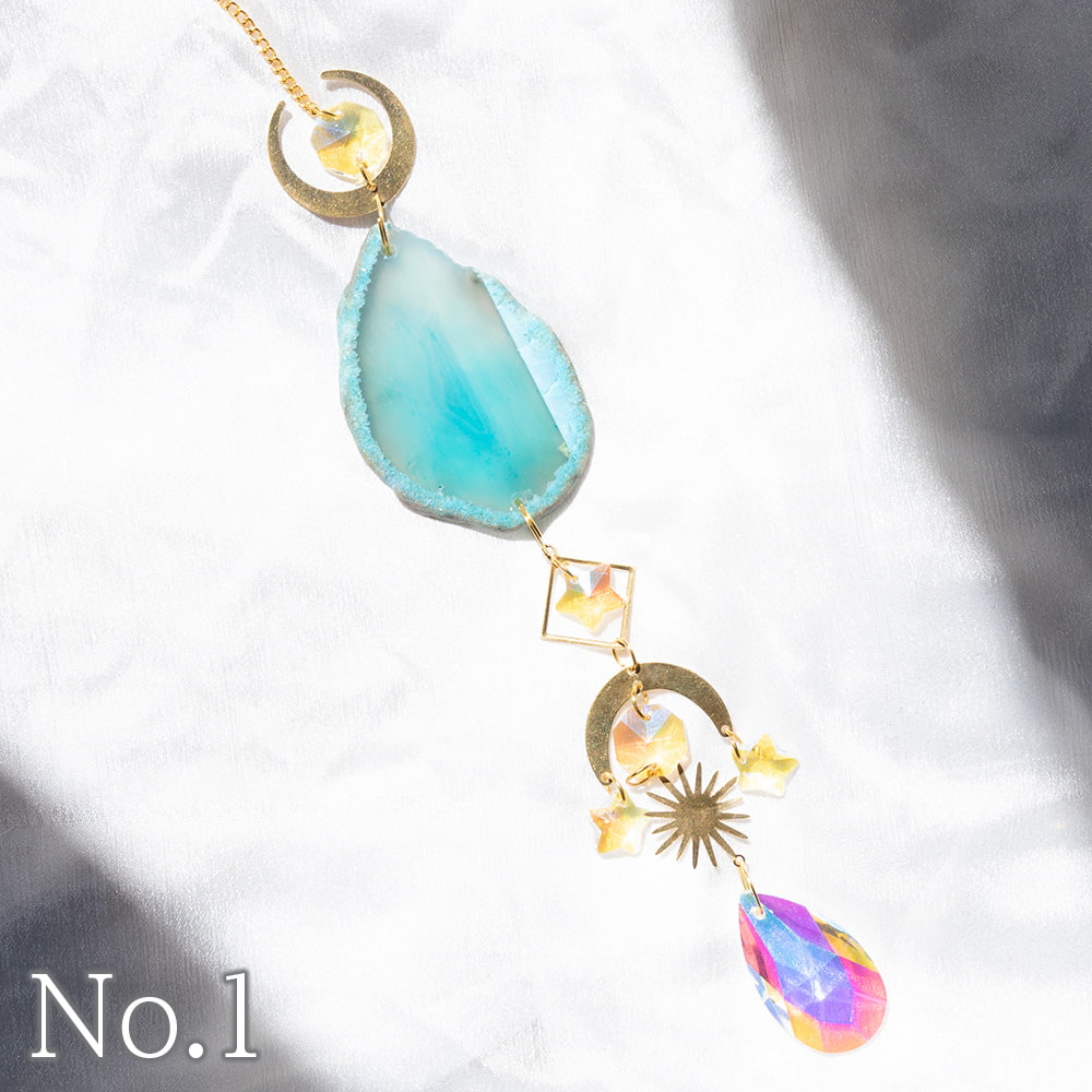 太陽の光を集めるクリスタル ストーン サンキャッチャー お部屋に小さな虹を運ぶ1枚目の下部説明写真です