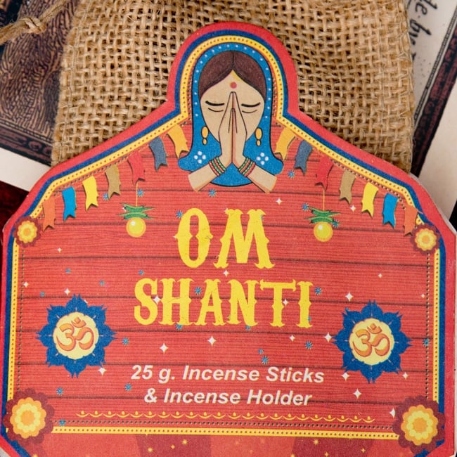 Great Indian Incense - OM SHANTI - ナグチャンパ 3 - ラベルの部分のアップです。ナマステの女性がインドらしいですね
