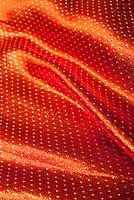 〔1m切り売り〕インドの伝統模様布 - ドット柄 オレンジ〔幅110cm〕の商品写真
