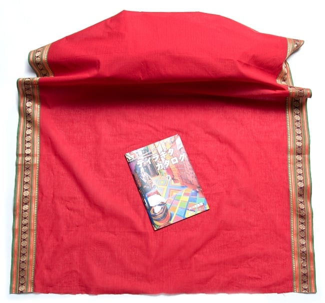 〔1m単位切り売り〕ボーダーコットンクロス　幅約111cm赤系 5 - A4の冊子と比べるとこれくらいの広がりになります。（画像は類似商品です）