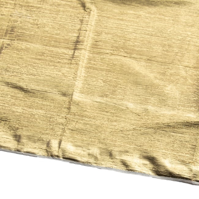 〔1m切り売り〕ゴールドプリント光沢布 - 幅約108cm 4 - 端の部分の処理を見てみました。