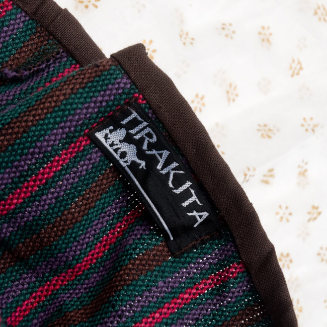 ネパールゲリのバックパック - ネイビー×茶 12 - TIRAKITAのロゴも入ってます。