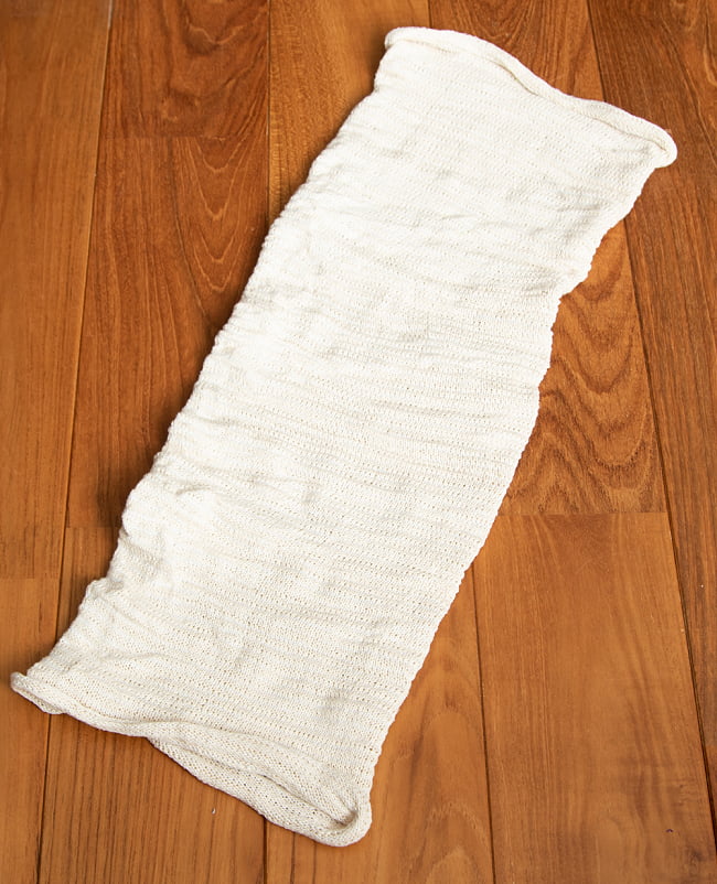 何通りも楽しめる!魔法のターバン - ホワイトの商品写真 2枚目 広げるとこのような形をしています。お好みに合わせてお使いください。