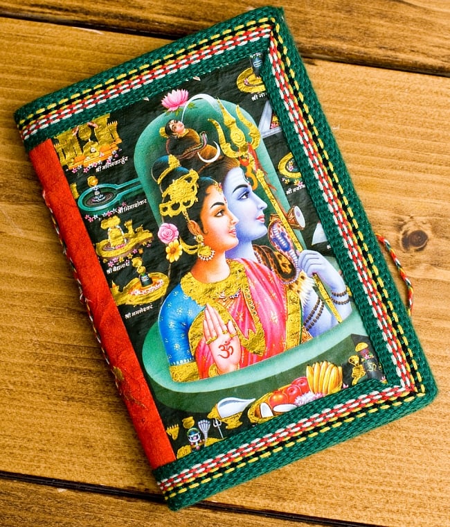 〈12.8cm×8.5cm〉インドの神様柄紙メモ帳 -シヴァとパールヴァティの写真1枚目です。全体写真ですメモ帳、ノート、神様