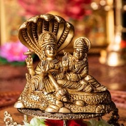 アナンタ竜の上で横たわる ヴィシュヌ ラクシュミー Vishnu Lakshmi ブラス製 高さ:約10cm
